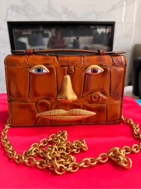Schiaparelli leather face clucth